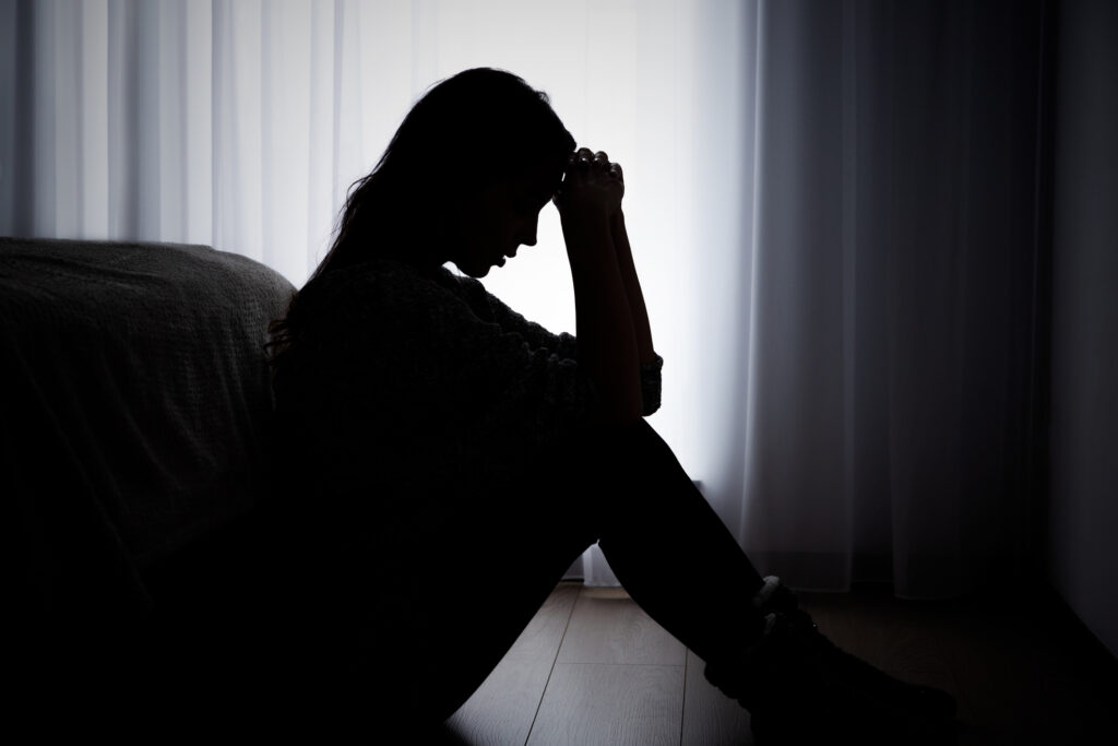 woman suffering from depression. sadness and headache concept